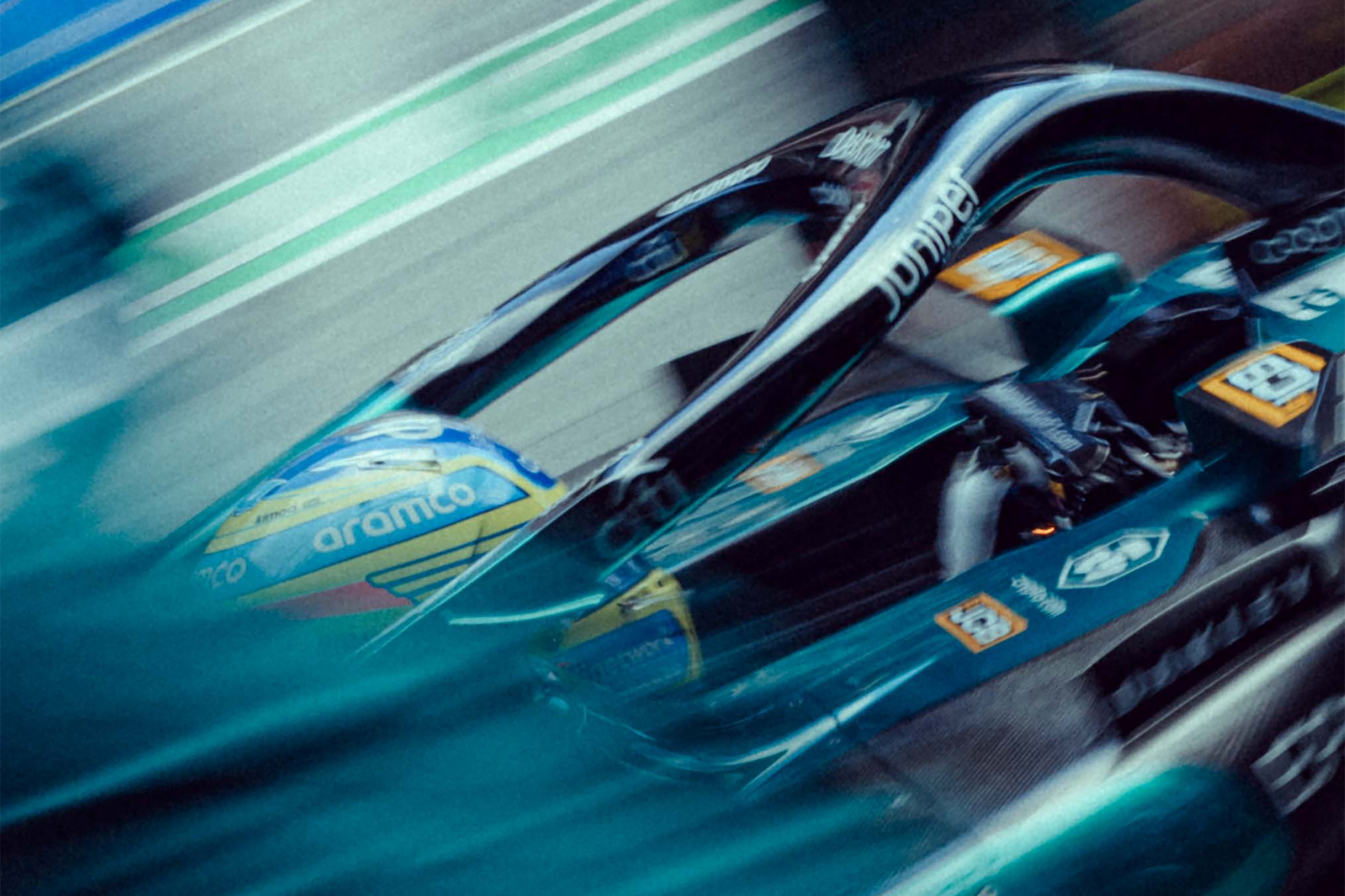 A Formula 1 car at speed in the pit lane